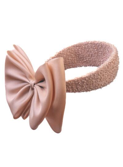 nude beaded headpiece with a supersized bow