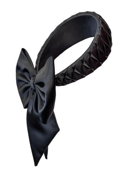 luxury black pleated headpiece with a bow