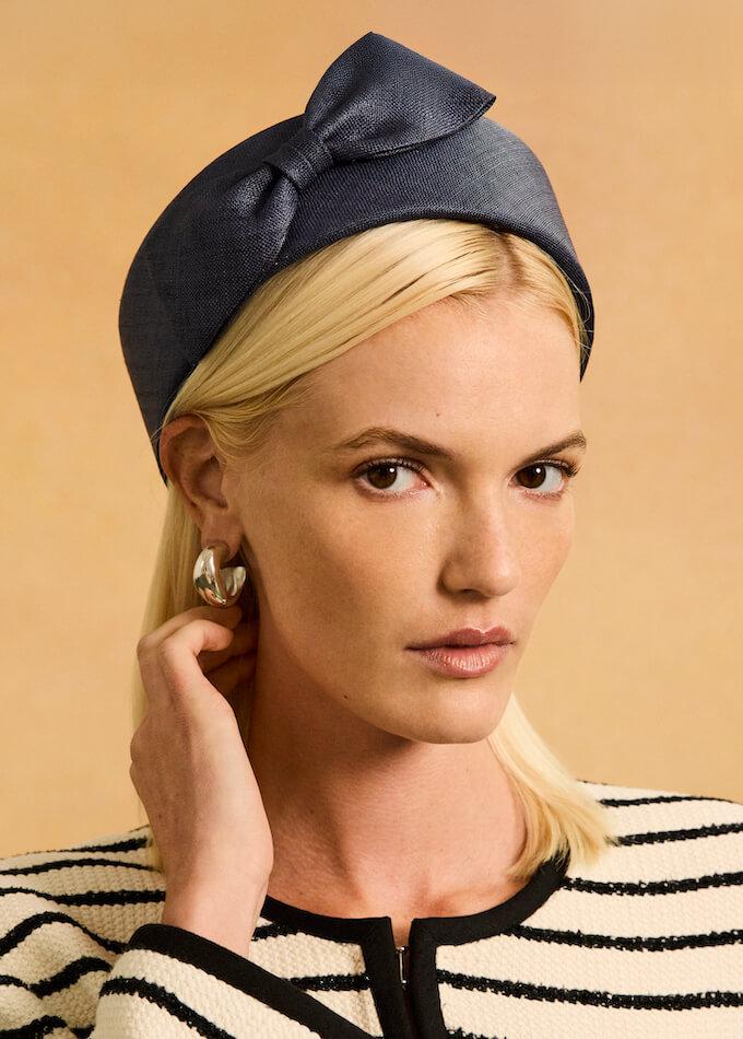 Parisisal straw blue pillbox hat with a bow