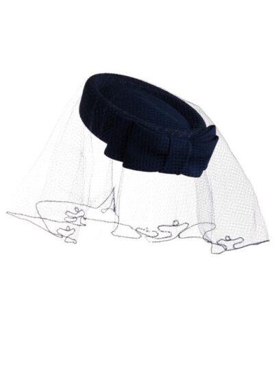 navy pillbox hat with a bow and a long veil